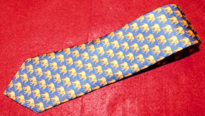 CORBATA TOOMAS ROSA HECHA EN INGLATERRA MOTIVO ELEFANTE AZUL/NARANJA - CORBATAS - CORBATAS PARA EL CUELLO. Foto 1 de 3