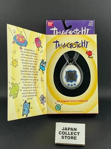 Bandai Tamagotchi #1800 blanco/azul 1997 nuevo abierto - Imagen 1 de 3