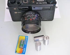 Yashica Electro 35 battery adapter Includes battery. All G series, GT GTS, etc. - Picture 1 of 11