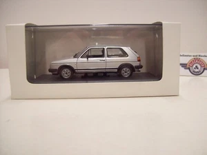 VW Golf II GTI, 1984, plata, caja blanca 1:43, embalaje original - Imagen 1 de 3