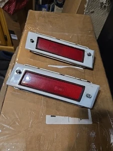 1984-1988 Chevy MONTE CARLO SS  REAR SIDE MARKER LIGHTS W BEZELS Oem - Picture 1 of 4