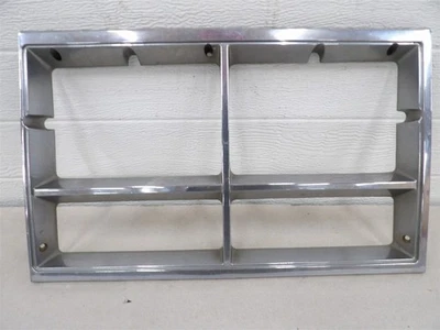 OLDSMOBILE 98 NINETY EIGHT 1977-1978 LH DRIVERS SIDE HEADLIGHT BEZEL DOOR OEM - Image 1 of 4