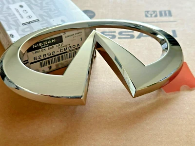 New OEM INFINITI FX35 FX45 2008  Front Grille Emblem 62892-CM80A - image 1 of 4