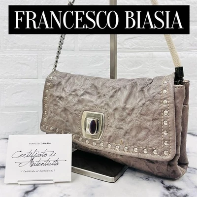 Bandolera Francesco Biasia de cuero gris plata cadena tachuelas Foto 1 de 4