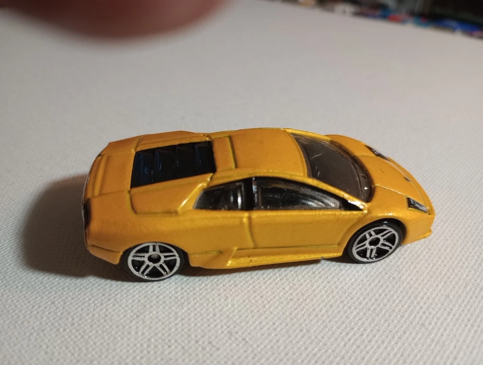 Hot Wheels/amarillo/Lamborghini Murcielago 2002 doble radio 5 velocidades ruedas cromadas  Foto 1 de 4