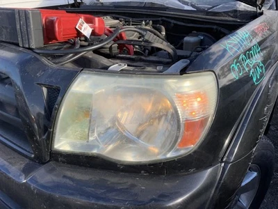 Driver Left Headlight Without Sport Package OEM 05-11 TACOMA 1313027 - Image 1 of 4