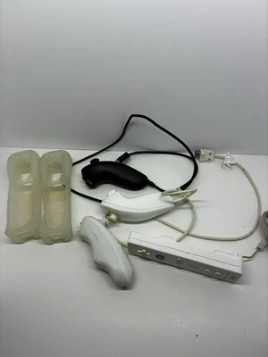 Nintendo Wii Remote Controller and Nunchucks - Image 1 of 4