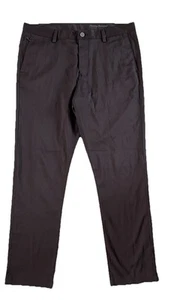 Tommy Bahama - Pantalones elásticos híbridos negros de rendimiento de golf - Talla 35 x 32 - Imagen 1 de 9