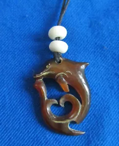 Hand Carved Horn Dolphin Adjustable Necklace~ NEW - Picture 1 of 3