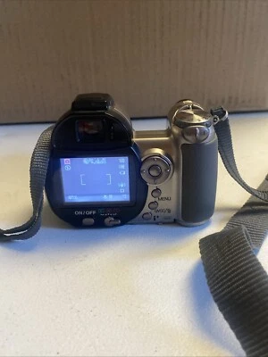 Konica Minolta DiMAGE Z6 6.0MP 12x Opti Zoom Digi Camera working READ DESC - Image 1 of 4