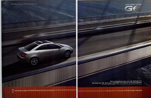 2004 Pontiac G6 4 Door Sedan Crossing Bridge Photo Vintage Magazine Car Print Ad - Picture 1 of 5