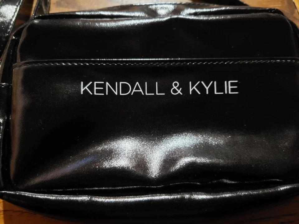 Kendall and Kylie branded, sleek black crossbody bag. Smaller in size, about 5" - Image 1 of 4