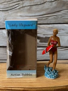 Figura de acción ACTION BOBBLE LADY SALVAVIDAS BOBBLE HEAD - 7,5"- RARA - Imagen 1 de 9