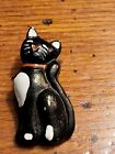 Metal And Enamel Black And White Cat Button.