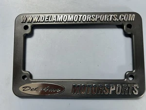 Del Amo Motorsports Motorcycle Dealership License Plate Frame. Plastic. New. - Picture 1 of 1