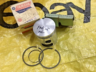 Pistón y anillo Yamaha 125 YA6 YA-6 0,25 NUEVO DE STOCK genuino 137-11631-61-99 y 137-11610-10 Foto 1 de 4