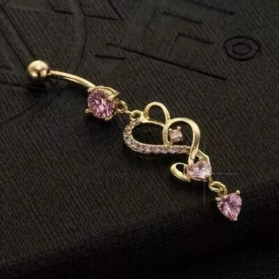 Anillo ombligo zafiro rosa creado en laboratorio corte corazón de 2 quilates enchapado en oro amarillo de 14 quilates Foto 1 de 4