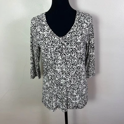 Top Apostrophe elástico negro blanco estampado floral cuello en V manga 3/4 Foto 1 de 4