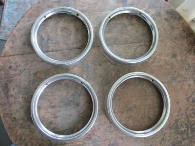 SET OF 4 ORIGINAL HEADLIGHT TRIM BEZELS FOR 1964 CHEVROLET IMPALA OR BELAIR - Image 1 of 4