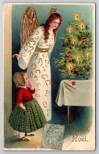 Joyeux Noel Postcard, Angel with Girl Admiring Candlelit Tree Dec. 24, 1905 - Picture 1 of 2