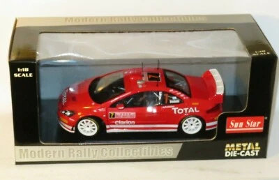1/18 Peugeot 307 WRC  Total  Rally Monte Carlo 2005  M.Gronholm - Image 1 of 4