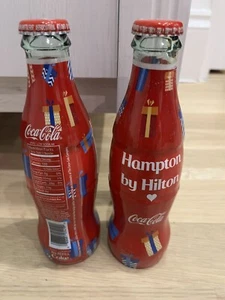 Coca-Cola Hampton by Hilton Wrapped USA Bottle FULL Limited edition 2024 - Picture 1 of 3