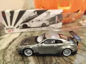 MINI GT 68 chase (aperto) NISSAN GT-R R35 Tipo 2 Ala Posteriore ver3 Bianco MINIGT - Foto 1 di 5