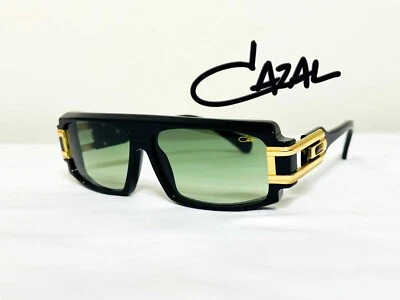 Gafas de sol Cazal marco negro y dorado lentes verdes tintadas para hombre y mujer Foto 1 de 4