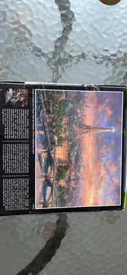 Rompecabezas metálico Paris Thomas Kinkade Foto 1 de 2