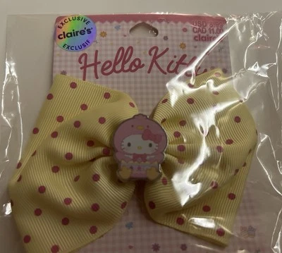 Nuevo moño de pelo Hello Kitty Claire's amarillo rosa lunares Foto 1 de 4