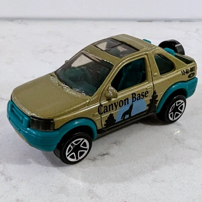 Land Rover Freelander MB406 1:59 Canyon Base Gold Green Matchbox 2000 de colección Foto 1 de 4