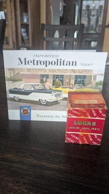 Nash Metropolitan 1955 NOS lente de matrícula de vidrio Foto 1 de 4