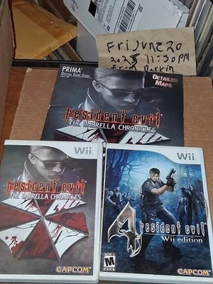 Resident Evil: The Umbrella Chronicles (Nintendo Wii, 2007) with strategy guide - Image 1 of 4