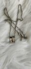 DKNY Stainless Steel Sculpted Metal, polished finish set with Crystals Necklace