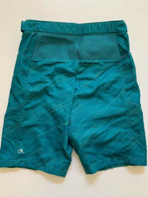 Pantalones cortos y forro de ciclismo de montaña Dakine (aqua, turquesa y negro) - talla pequeña  Foto 1 de 4