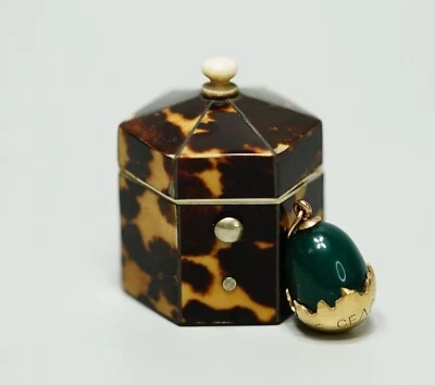 Colgante Fabergé 1913 oro 14k/56 ágata huevo medio agrietado H.W. Aniversario Romanov Foto 1 de 4