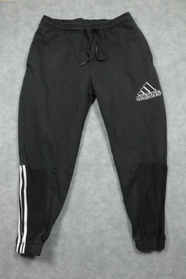 Pantalones deportivos Adidas para hombre medianos negros de vellón con logotipo 3 rayas Foto 1 de 4