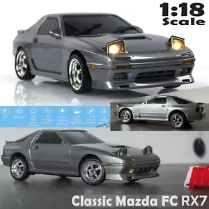 RC Drift Giroscopio Auto Full Proporzionale Proiettore Nascosto RWD Telecomando Mazda RX7 - Foto 1 di 22