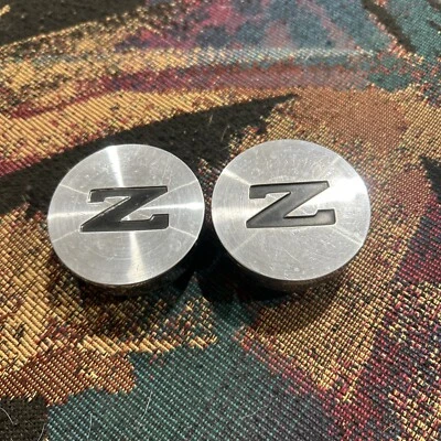 Tapacubos central 84 85 86 Nissan 300ZX OEM 62150 62151 40343-03P00 1 pieza Foto 1 de 2