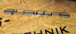 Quattro Schriftzug Grau kompatibel mit Frontgrill Audi A6 und andere Modelle - Bild 1 von 6