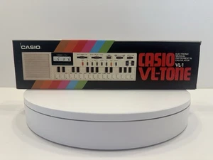 VINTAGE *NEW* 1980's Casio VL-Tone VL1 Electronic Music Instrument & Calculator - Picture 1 of 5