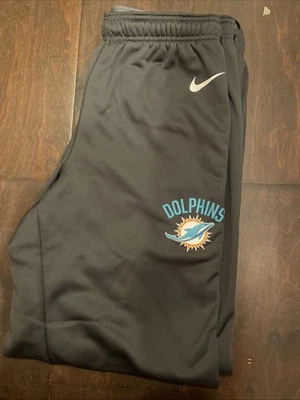 Pantalones deportivos NFL Miami Dolphins gris sobre el campo ajuste térmico talla grande Foto 1 de 3