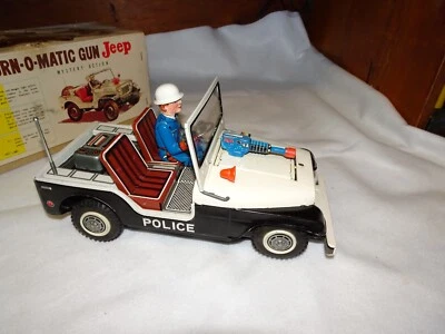 NOMURA TURN-O-MATIC GUN JEEP, BATTERY OPERATED  WITH BOX!! Light work drive Not - Image 1 of 4
