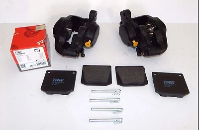 Par de pinzas de freno nuevas 16P MGC TR6 Healey 3000 GT6 TR4A pistones + pastillas de acero inoxidable Foto 1 de 4