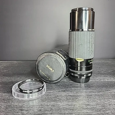 Sigma 75-250mm f/4-5 Zoom-8 Lens with Case and Achromatic Macro Lens Filter - Image 1 of 4