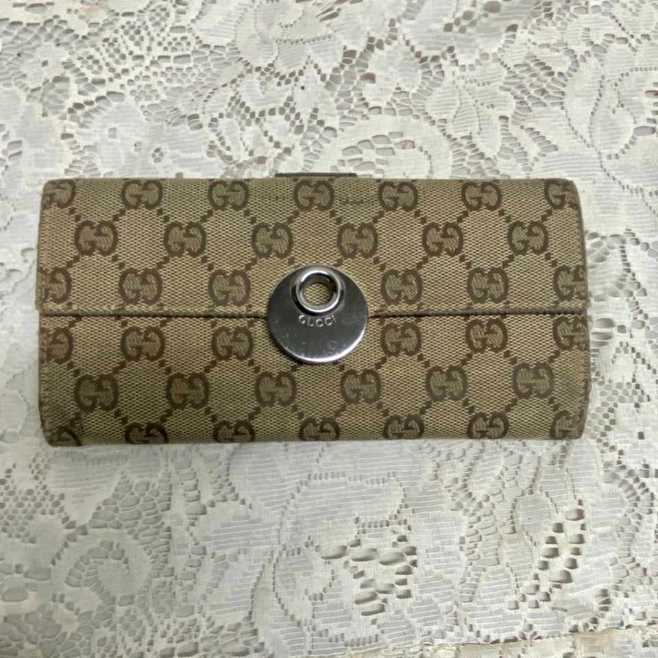 Authentic, Gucci Brown Canvas Long Bi-fold Wallet 7.5in x 4in - Image 1 of 4