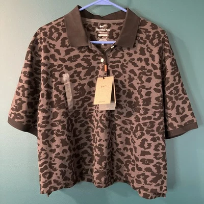 Camisa polo de golfe Nike feminina XL estampa de leopardo Dri-FIT preta cinza caimento solto nova com etiquetas - Imagem 1 de 4