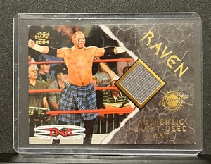 2004 Pacific TNA Raven Authentic Event Used Mat Relic Serial 0190/1525