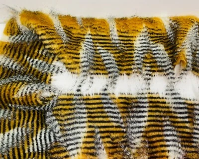 Lucci Yarns Faux Fur Fabric PieceStrip  64 X 5.5 Unit of 1 Golden Black Stripe - Image 1 of 4