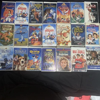 Lot of 21 Disney & MGM VHS Tapes Clamshell Case - Image 1 of 2
